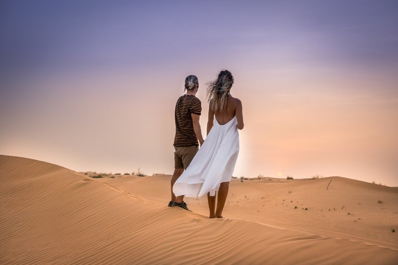 holiday couple desert safari camp